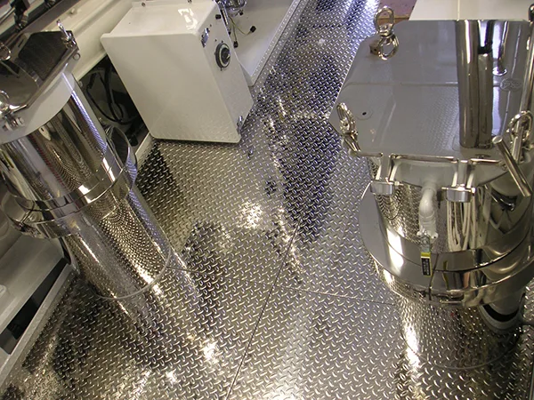 Diamond plate flooring megayacht engine room stainless brightwork